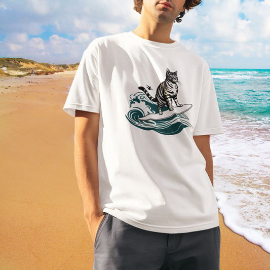 Man wearing a white T-shirt with a surfing cat design, looking chill and cool.