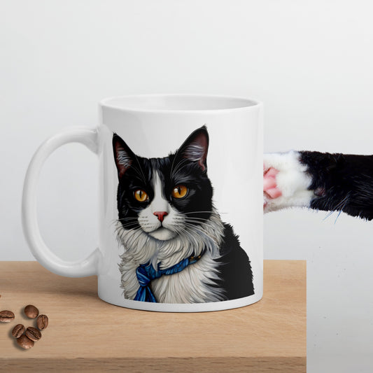 Glossy white tuxedo cat mug with a charming print on a bench, surrounded by coffee beans, as a black cat paw playfully reaches for it.