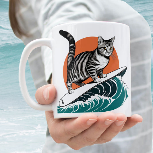 A woman extending her arm, offering a sleek white glossy mug featuring the playful Wave Rider Cat graphic.
