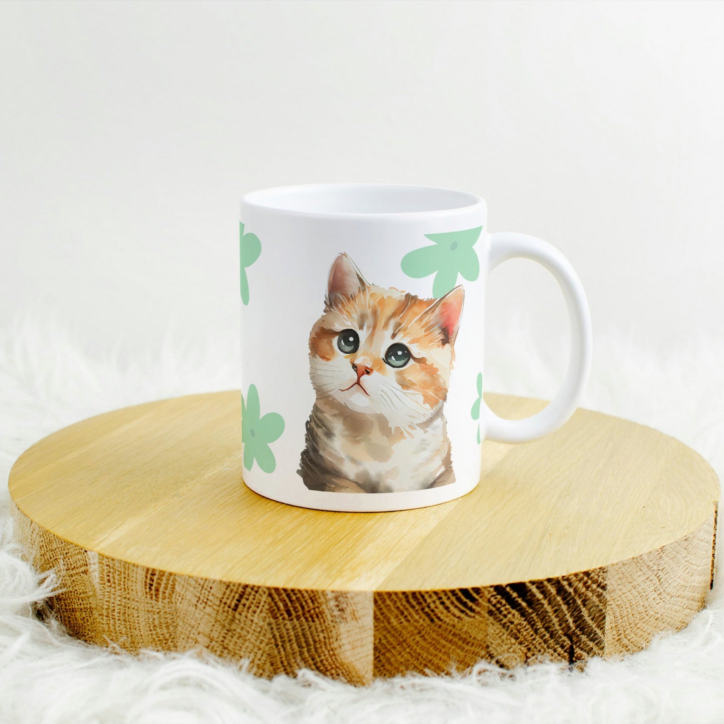 A white glossy ceramic mug featuring an adorable watercolor-style cat illustration and a charming clover pattern design, radiating artistic elegance, beautifully displayed on an elegant table.