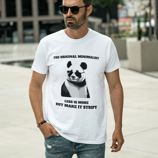 Man wearing white minimalist panda graphic tee with sunglasses and quote: 'THE ORIGINAL MINIMALIST, LESS IS MORE, BUT MAKE IT STRIPY.' Soft cotton unisex humor t-shirt.