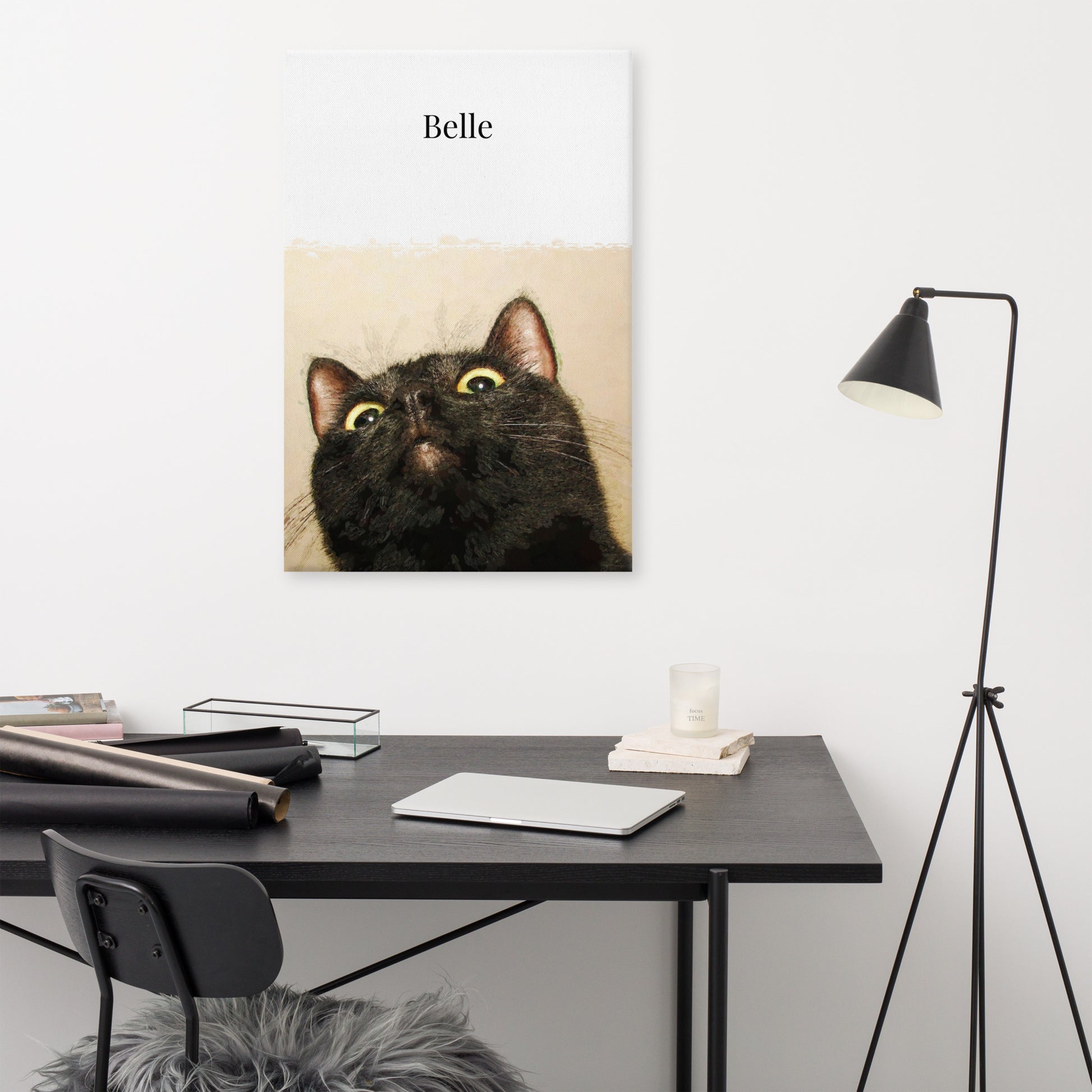 Custom pet portrait of a cute black cat portrait on a canvas displayed on a wall in a study room.