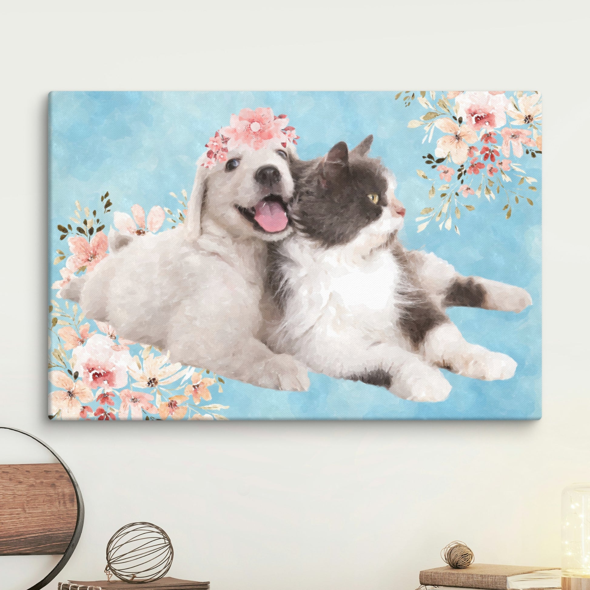 Canvas print of a dog and cat embracing with floral decorations on a blue background