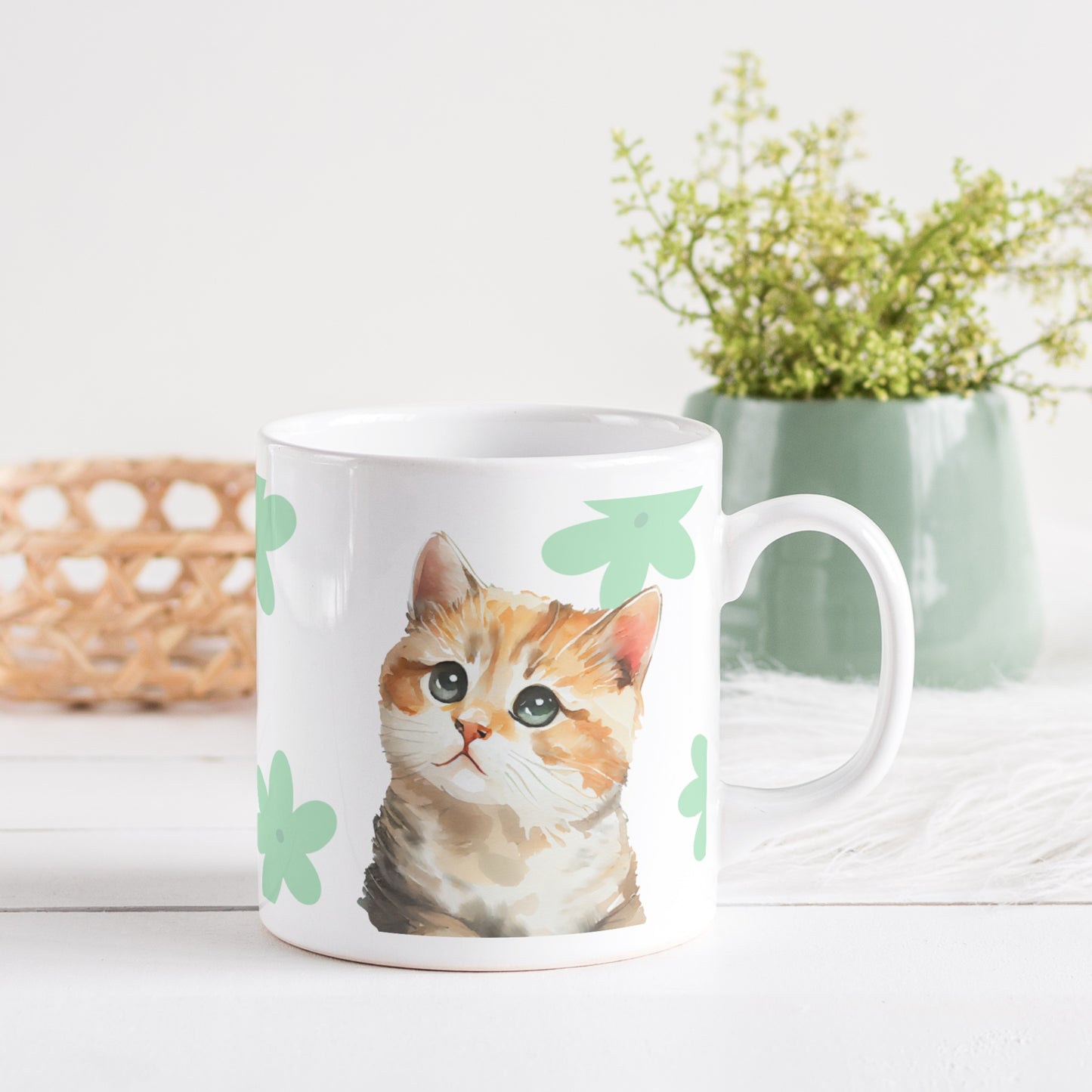 A white glossy ceramic mug featuring an adorable watercolor-style cat illustration and a charming clover pattern design, exuding artistic elegance, beautifully placed on a table in a modern living room setting.