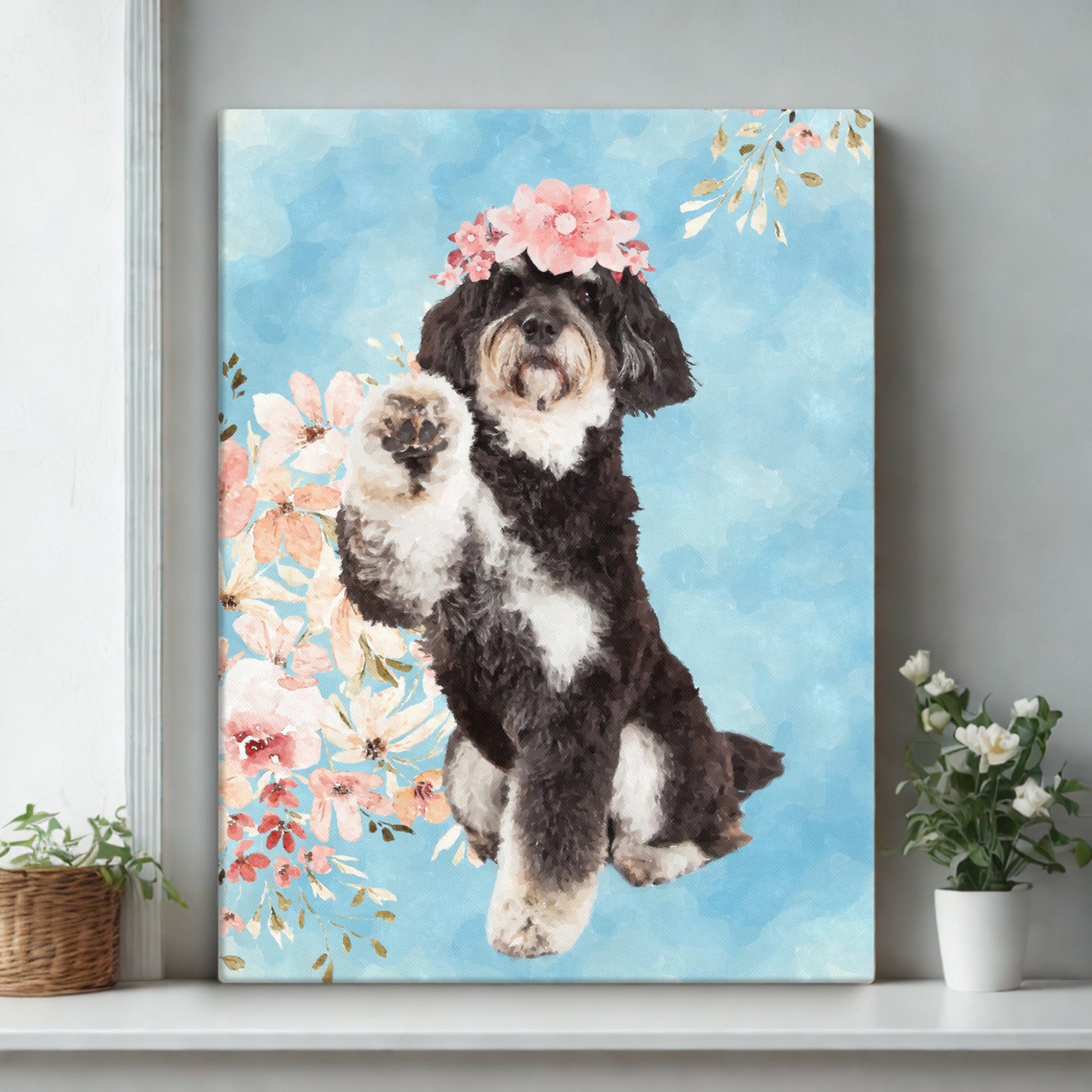 Custom watercolor portrait of a dog with soft floral accents, printed on canvas and displayed on a cozy white desk.