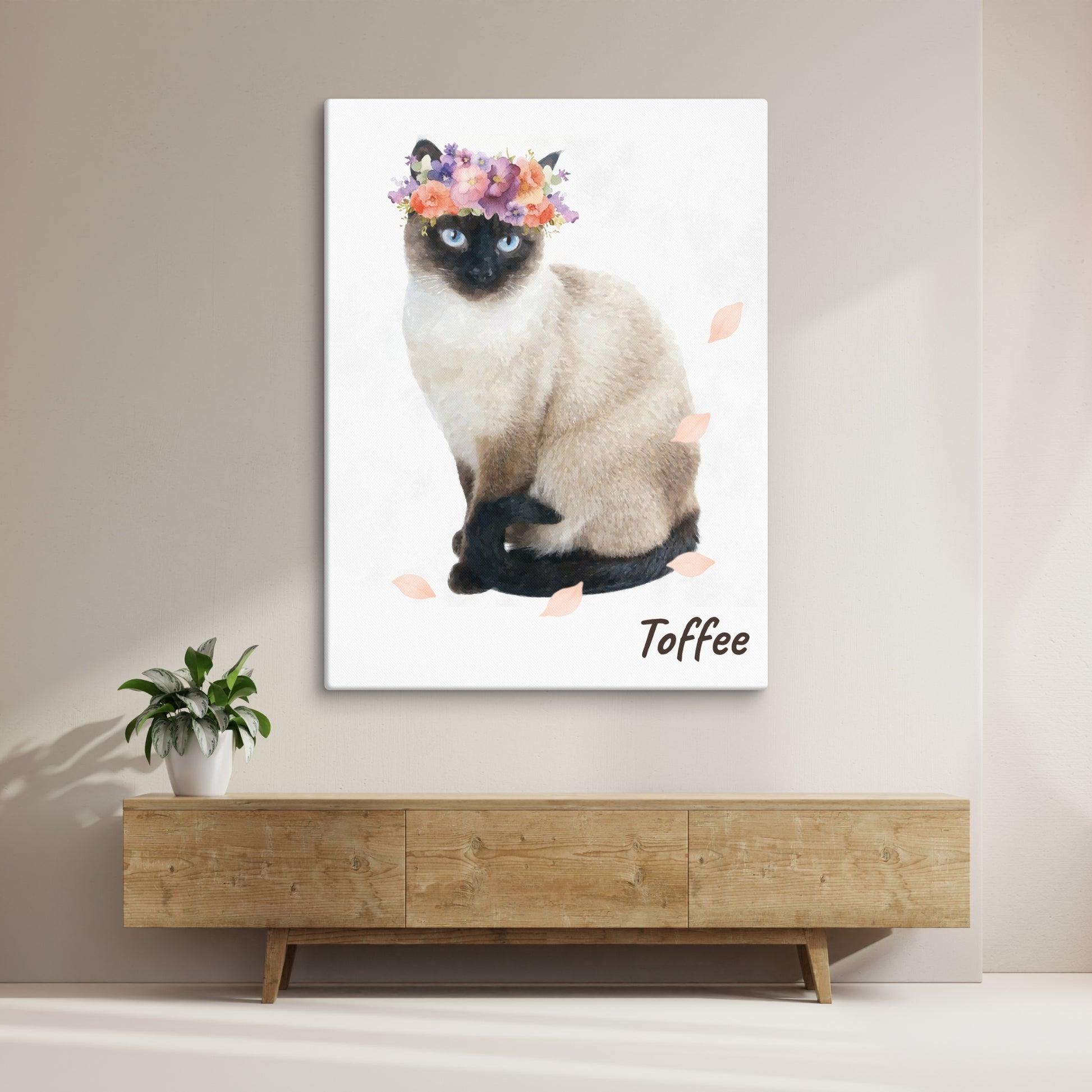 Watercolor portrait of a Siamese cat named Toffee wearing a colorful flower crown, with her name in cursive at the bottom right.