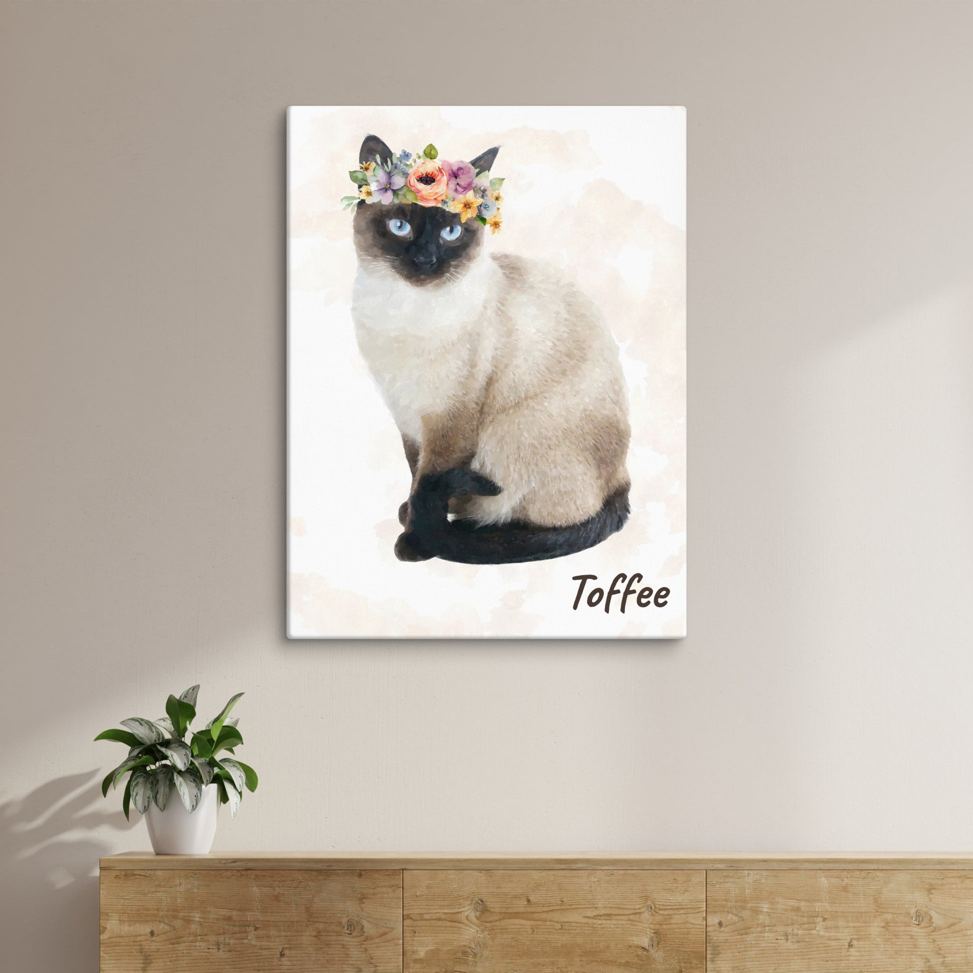 Watercolor portrait of a Siamese cat named Toffee wearing a colorful flower crown, .with her name in cursive at the bottom right
