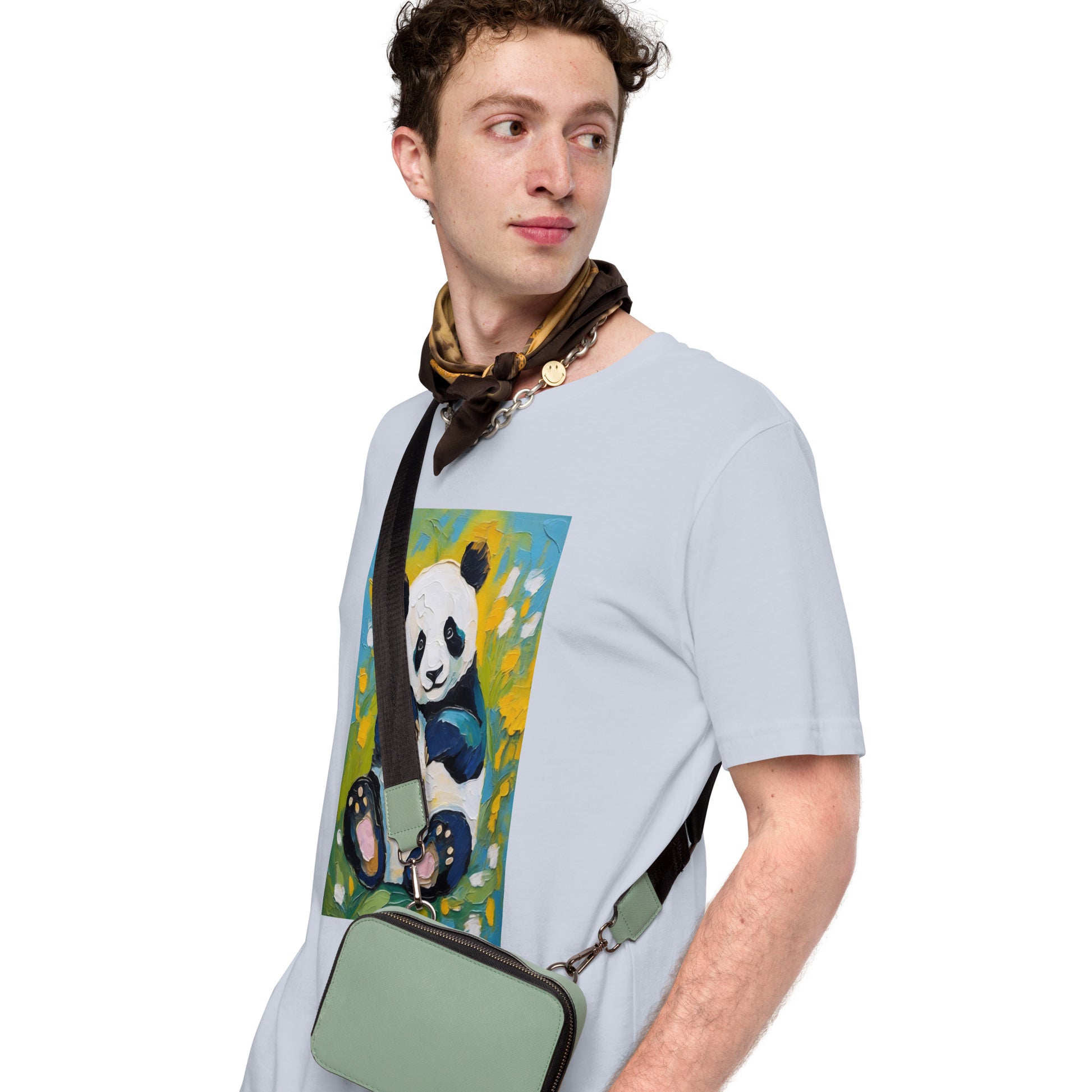 Stylish young man wearing a light blue cotton tee featuring an artistic oil-painting style panda surrounded by vibrant floral blossoms - a perfect blend of art and comfort.