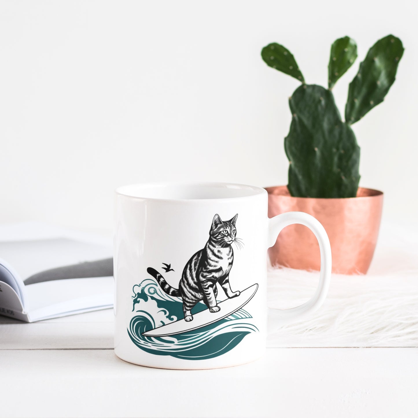 A sleek, white glossy mug featuring a playful surfing cat graphic, resting in a contemporary living room setting with stylish decor.