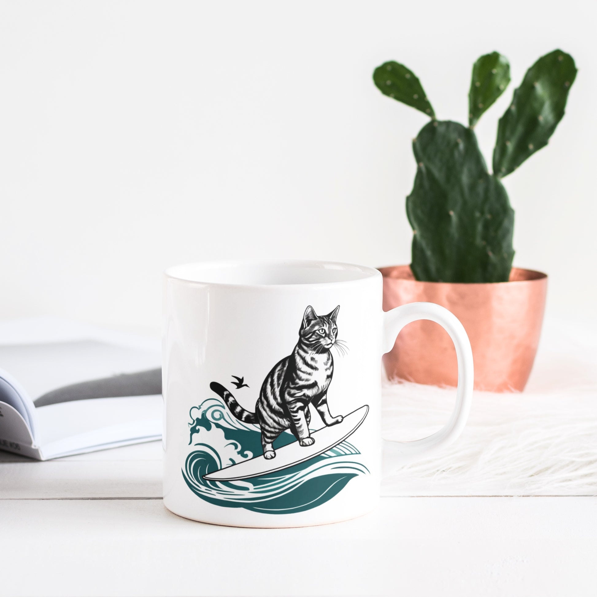 A sleek, white glossy mug featuring a playful surfing cat graphic, resting in a contemporary living room setting with stylish decor.