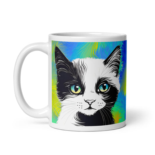 A white glossy ceramic mug showcasing a black and white cat against a vibrant, artistically designed background.