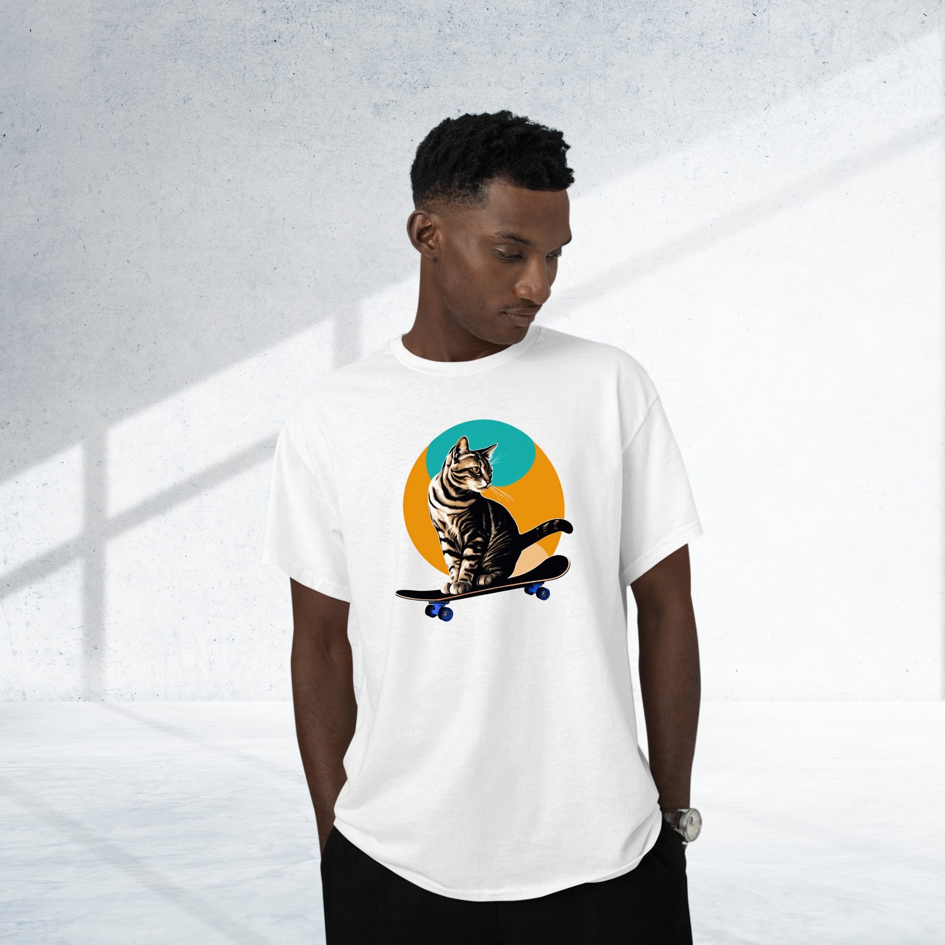 A man wearing a white short-sleeve cool cat shirt featuring a playful skateboarding cat graphic, showcasing a fun and casual style.